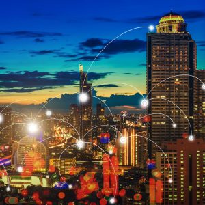 Skyscraper night city with connection icons. Smart communication